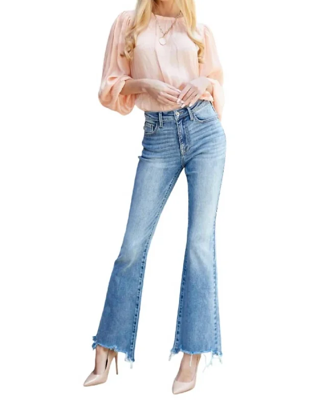 Mom jeans for a nostalgic and casual lookMid Rise Boot Cut Jeans In Medium