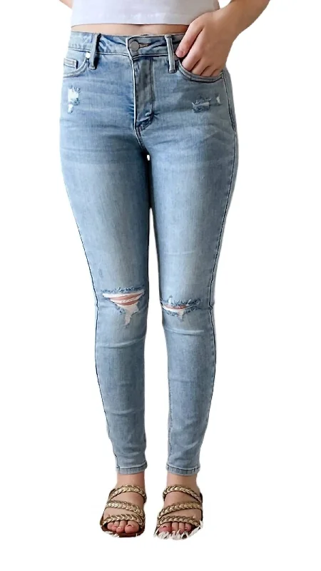 Jeggings women jeans combining the comfort of leggings and style of jeansMid Rise Tummy Control Distressed Jeans In Light Wash