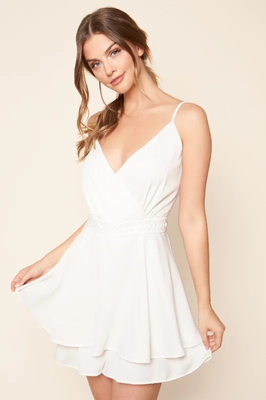 Women jumpsuits with cut - out details on the bodice for a trendy and bold lookAlicante White Surplice Sleeveless Romper Women jumpsuits with cut - out details on the bodice for a trendy and bold lookAlicante White Surplice Sleeveless Romper