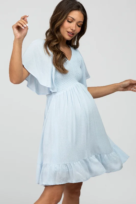 Plus Size Women Dress with a Flattering A - Line Cut for Comfort and Style Plus Size Women Dress with a Flattering A - Line Cut for Comfort and Style Light Blue Smocked Front Ruffle Hem Maternity Dress