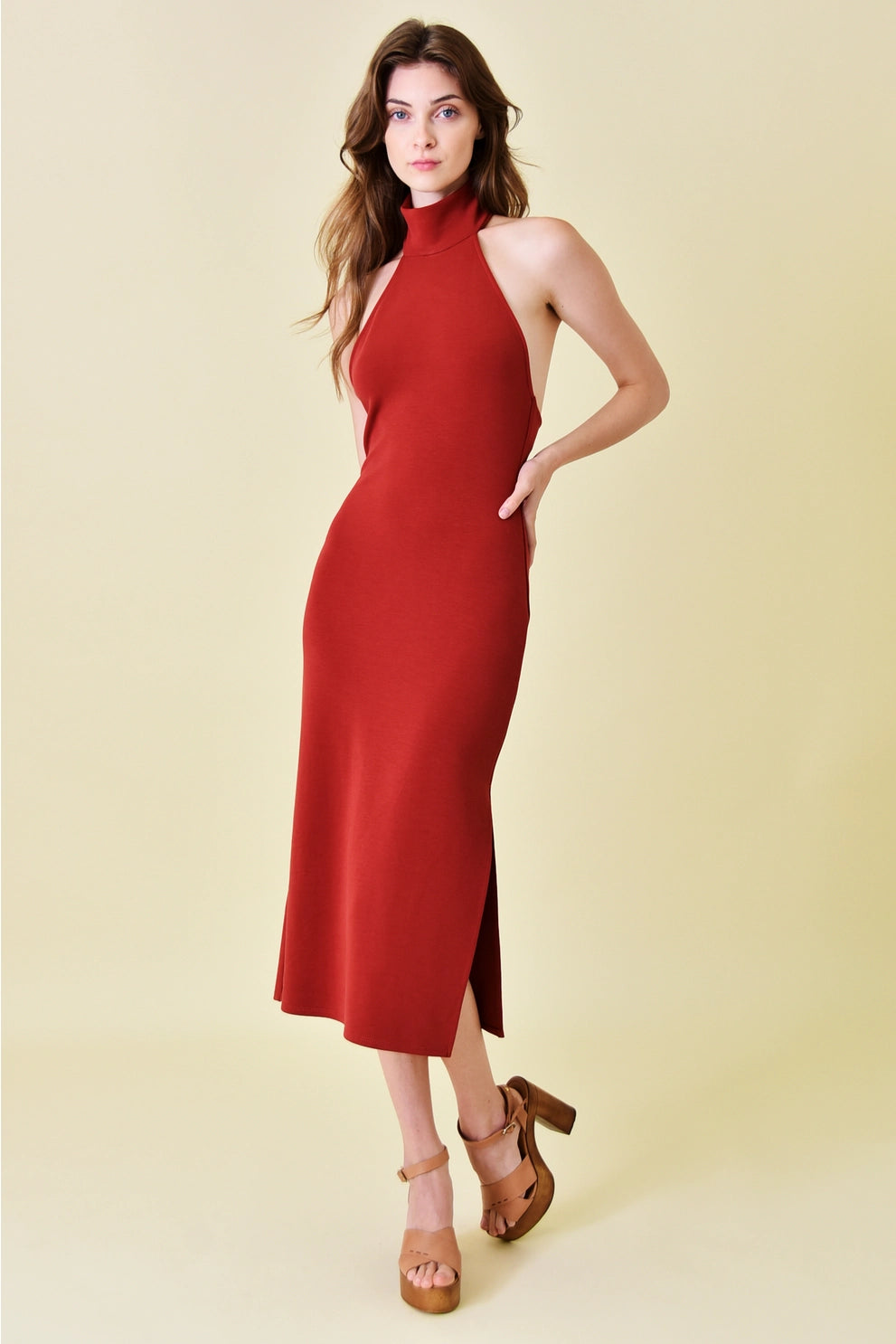 Midi dresses with geometric cutouts for a contemporary and edgy lookCognac Halter Turtle Neck Midi Dress Midi dresses with geometric cutouts for a contemporary and edgy lookCognac Halter Turtle Neck Midi Dress