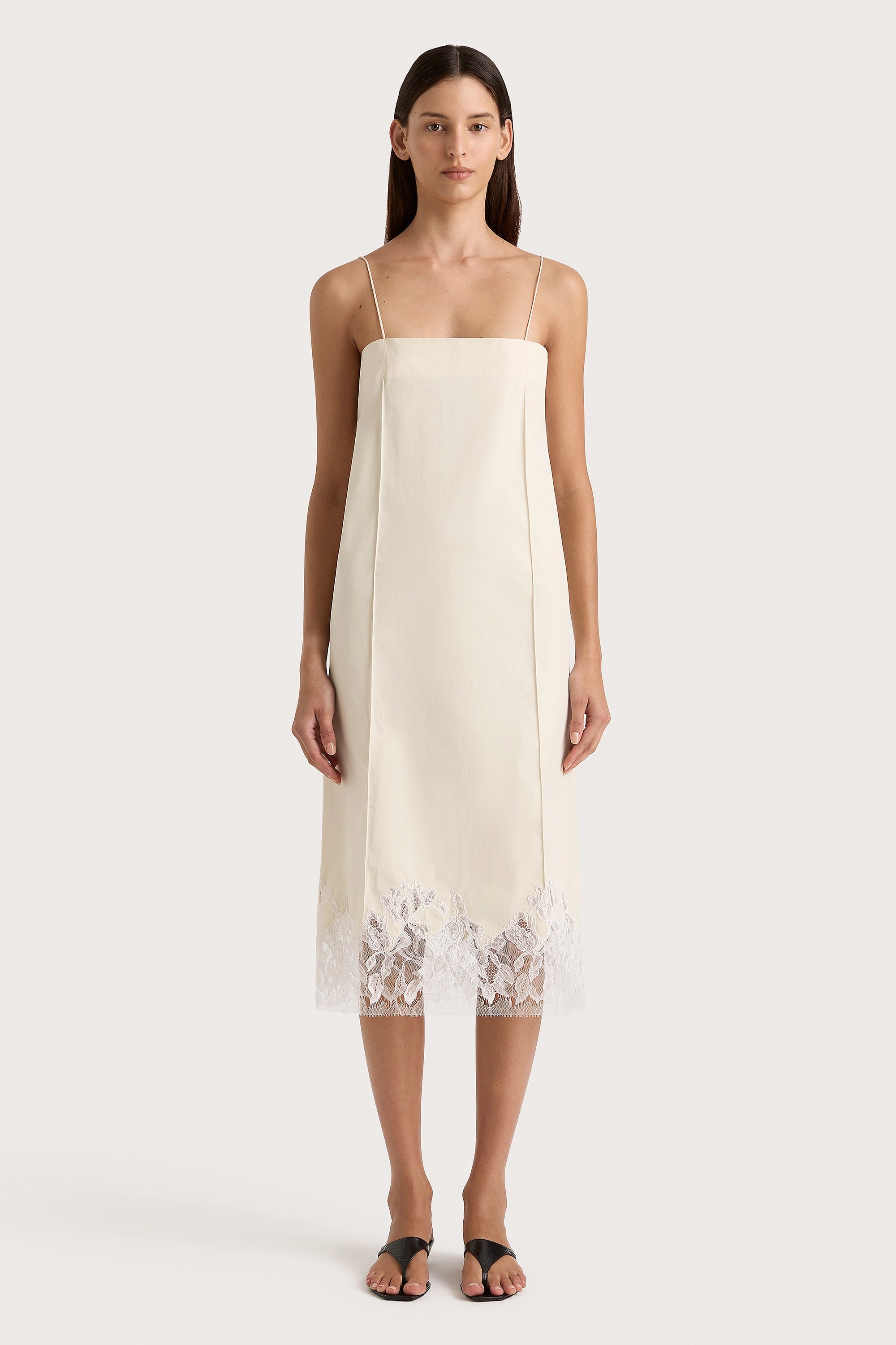 Midi dresses with keyhole backs for a flirty and unexpected detailEtienne Midi Dress Off White Midi dresses with keyhole backs for a flirty and unexpected detailEtienne Midi Dress Off White