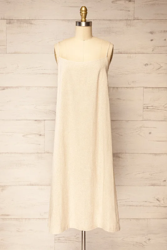 Midi dresses with keyhole backs for a flirty and unexpected detailLibby Beige | Oversized Slip Dress w/ Slit Midi dresses with keyhole backs for a flirty and unexpected detailLibby Beige | Oversized Slip Dress w/ Slit