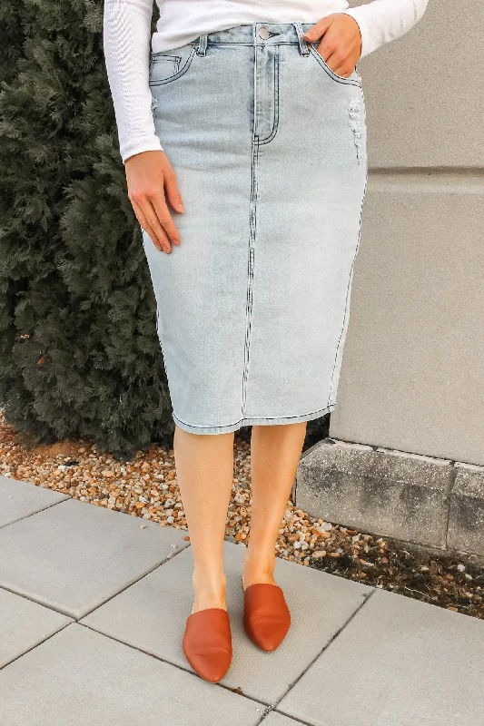 Denim skirts and blouses for a more formal ensembleCali Distressed Denim Skirt