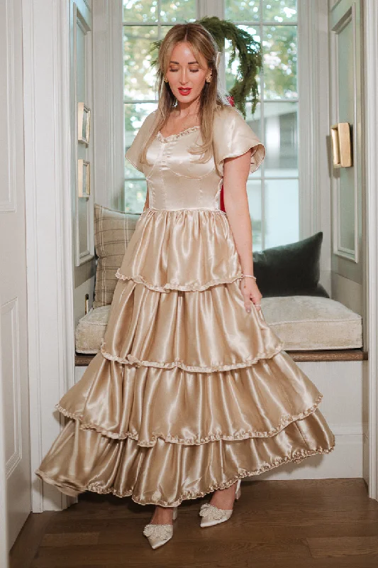 Maxi dresses with cold - shoulder cutouts for a trendy lookArabelle Dress in Champagne Maxi dresses with cold - shoulder cutouts for a trendy lookArabelle Dress in Champagne