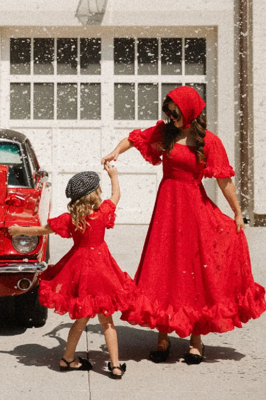 Maxi dresses with tassel accents for a fun and lively touchKendy Dress in Red