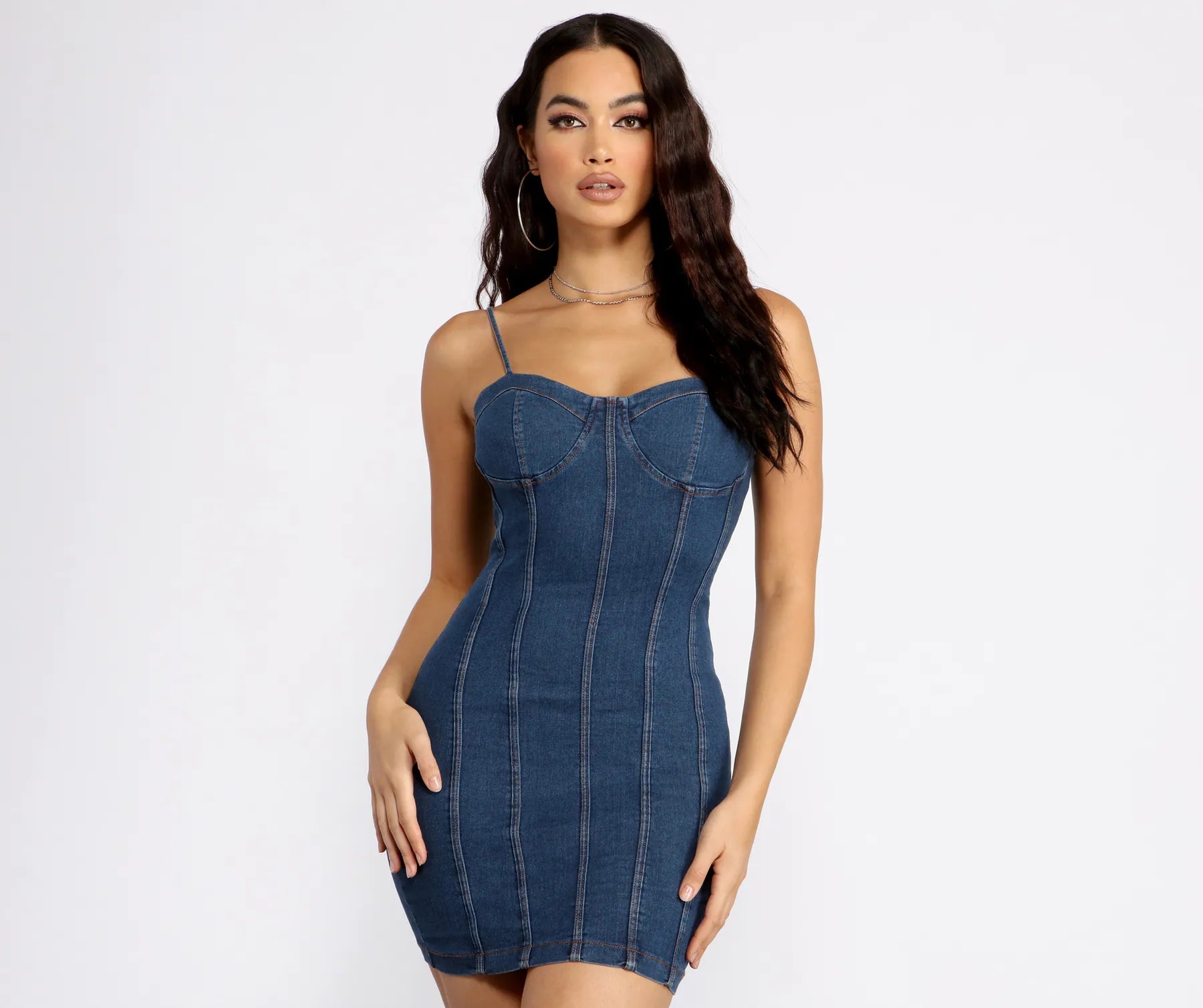 Mini dresses with tassel accents for a fun touchBabe In Denim Mini Dress