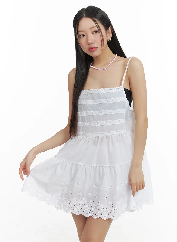 Mini dresses with pocket details for added functionalityCotton Ruffle Cami Mini Dress OA402 Mini dresses with pocket details for added functionalityCotton Ruffle Cami Mini Dress OA402