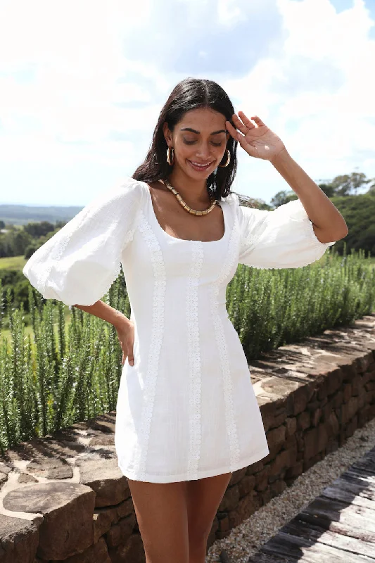 Polyester mini dresses for easy careCrashing Into You Dress White
