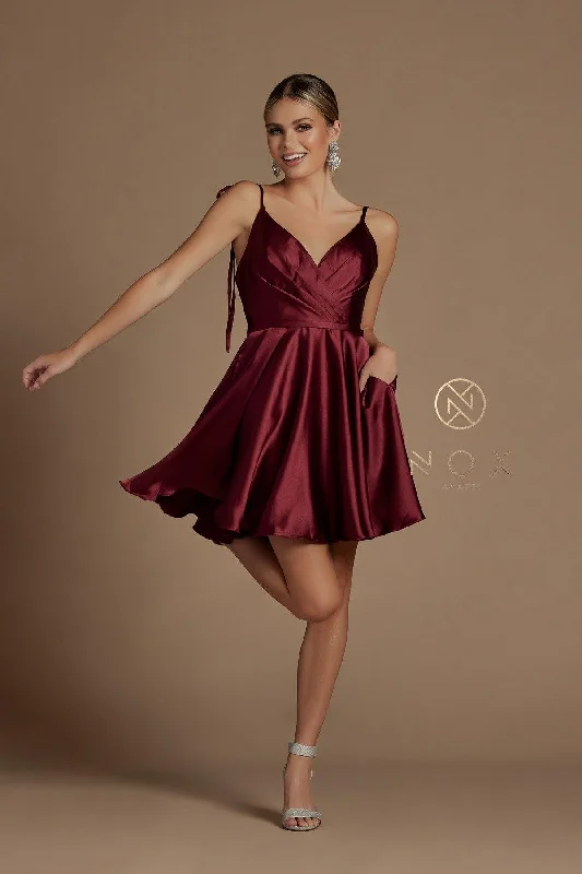 Cocktail dresses with a tiered skirt and a bow at the waistHomecoming Short Spaghetti Strap Cocktail Dress Cocktail dresses with a tiered skirt and a bow at the waistHomecoming Short Spaghetti Strap Cocktail Dress
