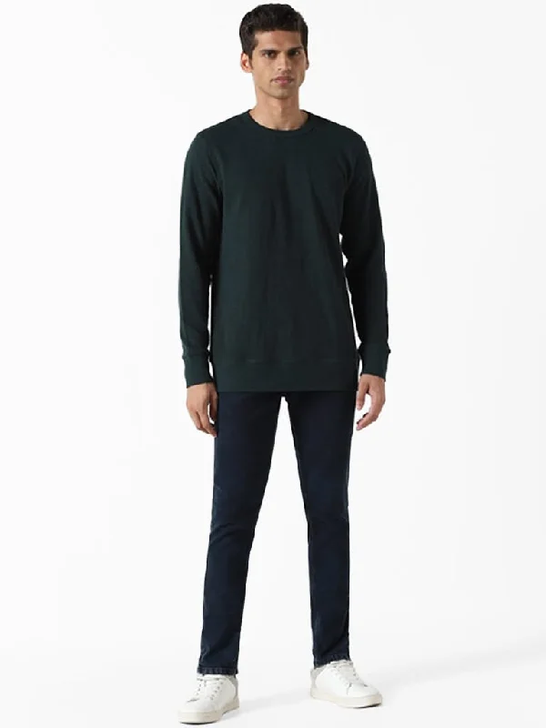 Ruffled Hem Women Shorts to Add a Feminine TouchWES Casuals Solid Green Ribbed Slim-Fit Sweater Ruffled Hem Women Shorts to Add a Feminine TouchWES Casuals Solid Green Ribbed Slim-Fit Sweater