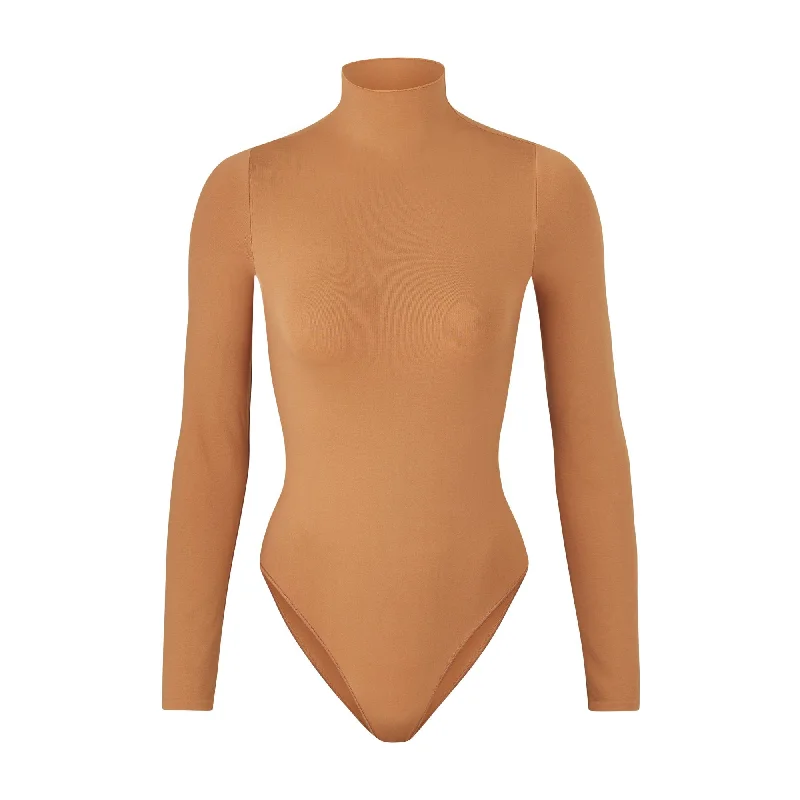 Mesh Bodysuits for a Bold and Edgy Fashion StatementESSENTIAL MOCK NECK LONG SLEEVE BODYSUIT | CAMEL Mesh Bodysuits for a Bold and Edgy Fashion StatementESSENTIAL MOCK NECK LONG SLEEVE BODYSUIT | CAMEL