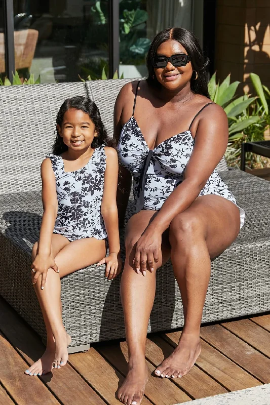 Women's Cut - Out One - Pieces in Black with Geometric Shapes for a Modern and Edgy StyleMarina West Swim Côte d'Azur Ruffle Trim One-Piece Swimsuit Women's Cut - Out One - Pieces in Black with Geometric Shapes for a Modern and Edgy StyleMarina West Swim Côte d'Azur Ruffle Trim One-Piece Swimsuit