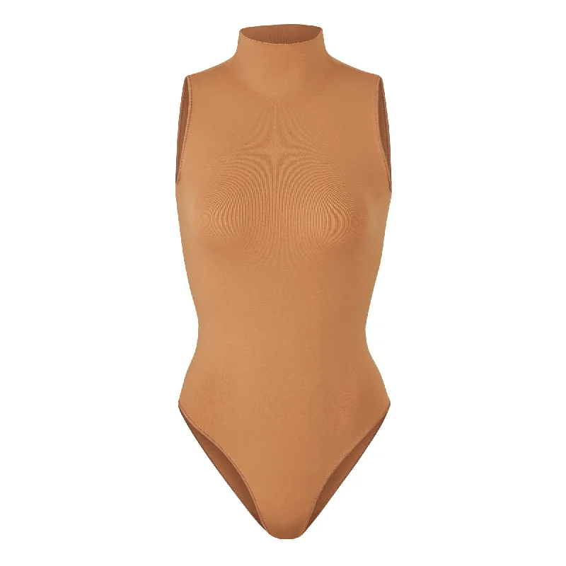 Compression Bodysuits for Post - Workout RecoveryESSENTIAL MOCK NECK SLEEVELESS BODYSUIT | CAMEL Compression Bodysuits for Post - Workout RecoveryESSENTIAL MOCK NECK SLEEVELESS BODYSUIT | CAMEL